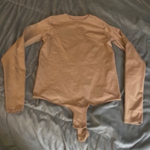 Women’s size Medium Skims bodysuit in Nude